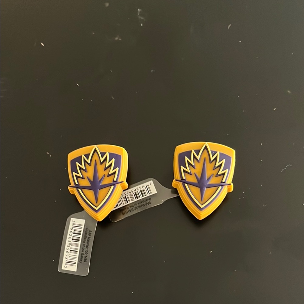 2 Gold Marvel Guardians of the Galaxy Shield croc charms/jibbits